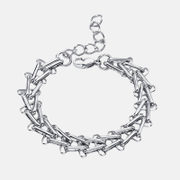 Elegante pulsera de acero inoxidable con escalera.